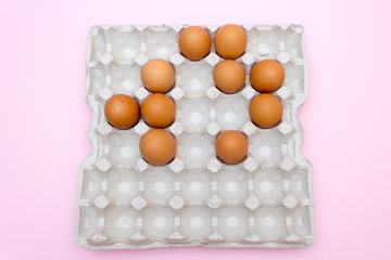 Egg, Eggs on a pink background. Eggs tray
