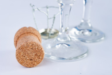 Champagne cork and metal basket on the table. Special closure from sparkling wine.