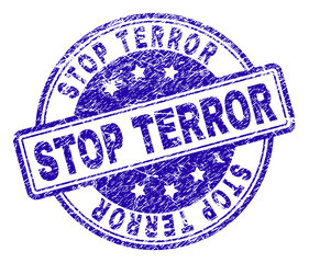 STOP TERROR stamp seal watermark with distress texture. Designed with rounded rectangles and circles. Blue vector rubber print of STOP TERROR label with retro texture.