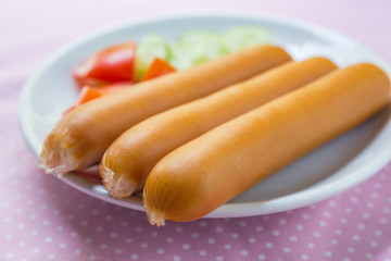 Heap of sausages on a table