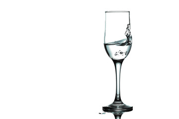 water splash and wine glass. splash alcohol in wine glass