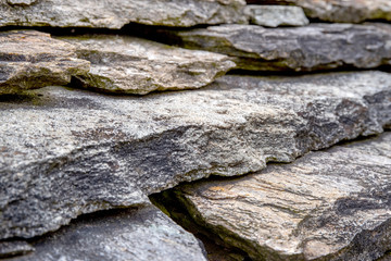 Close-up of a grey stone roof