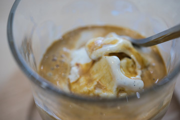Fototapeta na wymiar Affogato coffee, espresso shot with vanilla ice cream, background concept.