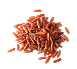 Pile of uncooked brown rice on white background