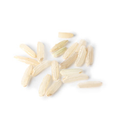 Uncooked brown rice on white background, closeup view