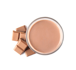 Glass with tasty chocolate milk on white background, top view. Dairy drink