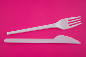 Plastic fork and knife isolated