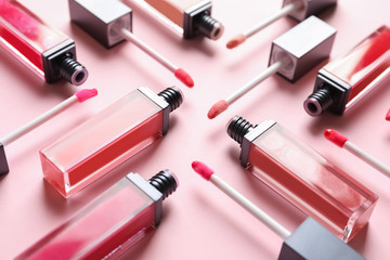Composition of liquid lipsticks on color background