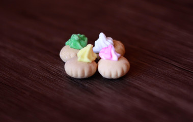 Rose gem biscuit on wood background. Popular childhood snack.
