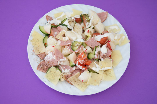fresh vegetable salad on yellow background