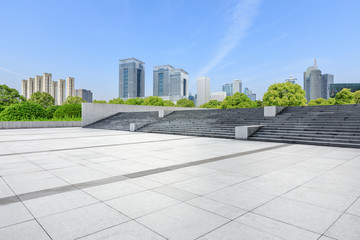 Empty square floor and modern commercial building in Shanghai