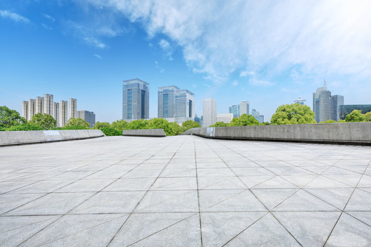 City square floor and modern commercial building in Shanghai © ABCDstock