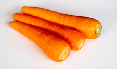 Fresh carrot isolated on white background.