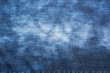 Denim worn fabric texture for background