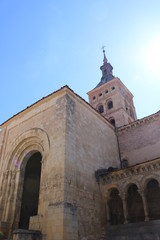 Fototapeta na wymiar Side view of San Martin Church in Segovia, Spain, a Catholic temple erected in the XII century inside the city walls.