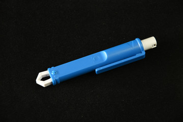 Blue Extractor for removing ticks,TICK TWISTER in a hand