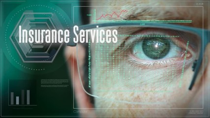 A close up of a businessman eye controlling a futuristic computer system with a Business Insurance Services concept.