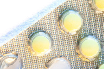 medicinal tablets in the started packaging, macro, isolate