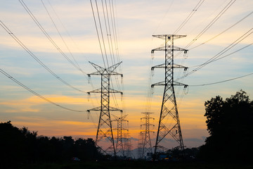 high power tower with sunset view