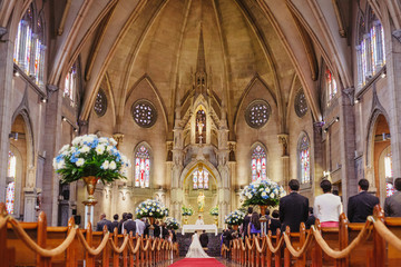couple getting married in a beautiful gothic church