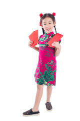 Full length of little chinese girl in red color traditional dress stand,holding red packet money and smiles isolated over white background