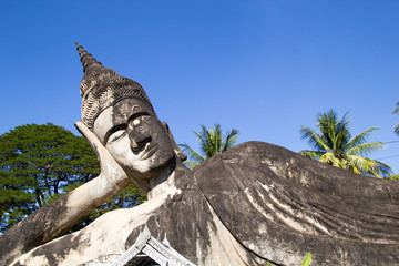 Buddha Park (Wat Xieng Khuan) is a famous sculpture park with more than 200 religious.