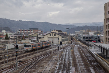 Fototapeta na wymiar Japanese Railway station in Hida-Takayama station in Chubu, Japan with lot of Railroad tracks