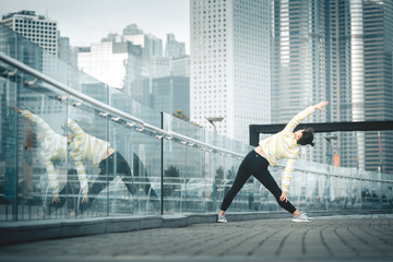 Fototapeta na wymiar Young asian woman doing excusice in the city