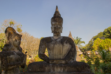 Buddha Park (Wat Xieng Khuan) is a famous sculpture park with more than 200 religious.