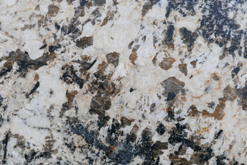 brown, gray and white marbled granite surface