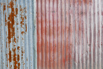 Grungy colorful corrugated metal wall