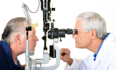 An Ophthalmologist and patient with a Slit Lamp