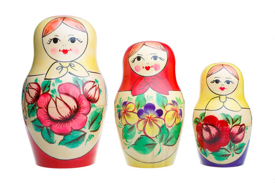 Three Russian dolls on white background
