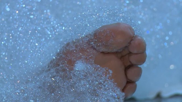 Masseurs use special foam to massage the client