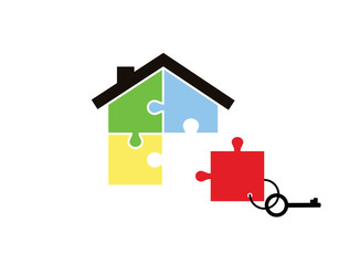 House of pieces of a puzzle and keys with a key fob missing parts isolated on white background. Business, deal, construction, shopping.