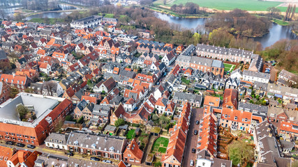 Aerial top view of Naarden city fortified walls in star shape and historic village in Holland from above, Netherlands
