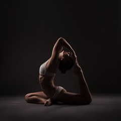 Healthy latino woman doing yoga