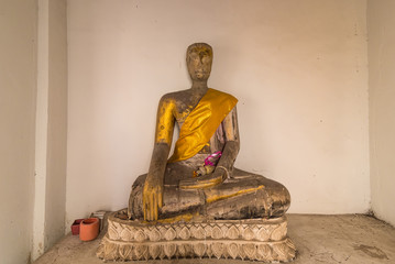 Old buddha statue of Wat Nakhon Luang Tample,Prasat Nakhon Luang in Ayutthaya,Thailand.