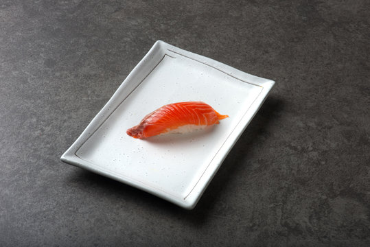 salmon sushi on plate