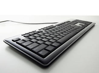 Generic black modern computer keyboard on white background