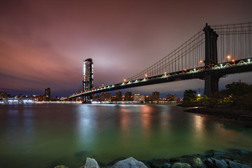 New York city skyline Manhattan Bridge at dusk
