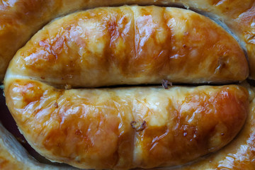Sausages on the plate. Close-up sausage and meat.
