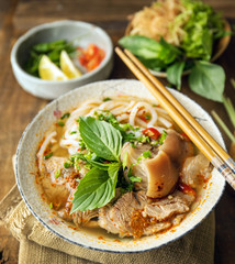 Bun Bo Hue, Bun Bo, Vietnamese beef noodle soup spicy. A bowl of beef & rice vermicelli soup,...