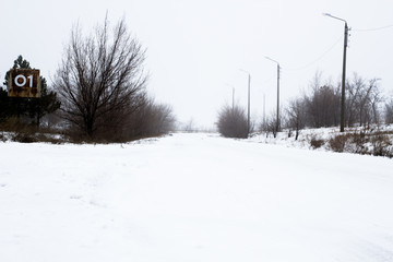 Winter weather , snow road , foggy snow