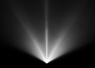 wide lens projector with black and white light beam for movie and cinema at night . smoke texture...