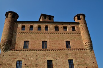 Grinzane Cavour, Piedmont, Italy. July 2018. The majestic castle made of red bricks.