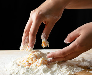 chef hands knead dough