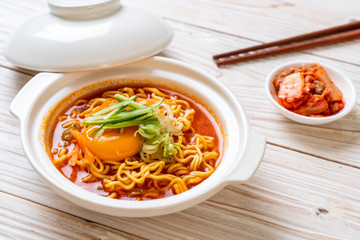 korean spicy instant noodles with egg, vegetable and kimchi