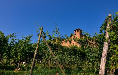 Fototapeta na wymiar Grinzane Cavour, Piedmont, Italy. July 2018. The majestic castle made of red bricks.
