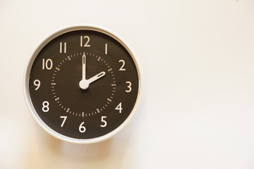 The time for wall clock of the room is a scene of 2:00
